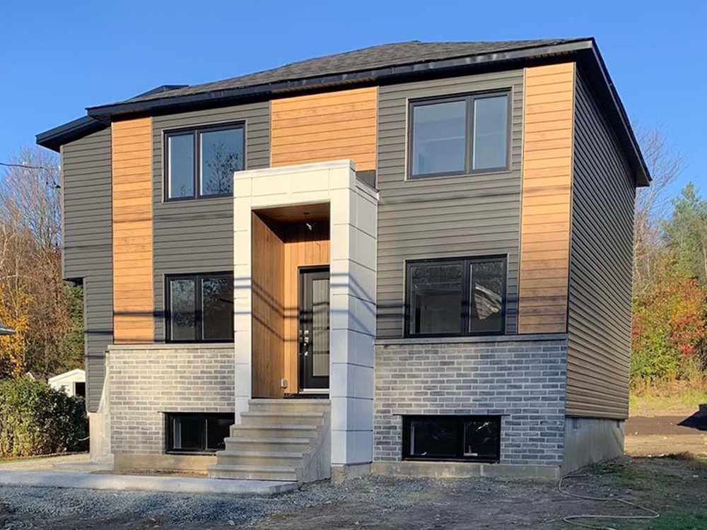 Construction résidentielle haut de gamme et rénovation majeure en Estrie | REOVA Construction
